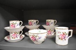 A set of six coffee canisters with cream and sugar bowl by Cauldon china