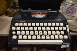 A mid century typewriter by Brother Deluxe 220