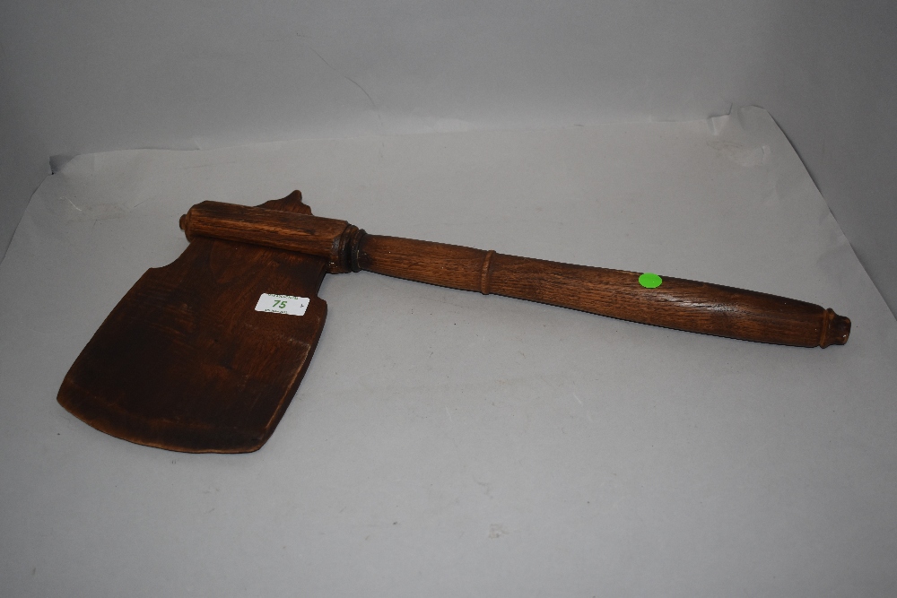 A 20th century hand made wooden replica battle axe