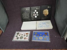A collection of GB Coin Sets, 1983 and 1986 Year Sets, Forth Circulating Coinage Portrait Set