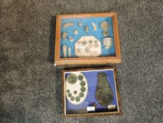 Two framed and glazed displays of Detector Finds, frame 1 contains Georgian and Victorian Bronze