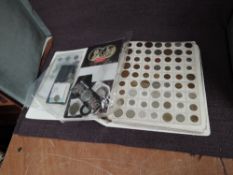 A World Coin Album, a small amount of Silver seen, many hundred coins