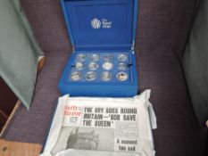 A Royal Mint The Queens Diamond Jubilee Collection Silver Proof Crown Sized Coins in plush blue