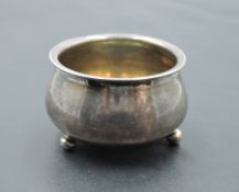 A small 19th Century Russian silver salt of cauldron form having trefoil bun feet, St Petersburg