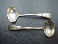 A pair of Edwardian silver sauce ladles, Old English with pip reverse, marks for London 1902,