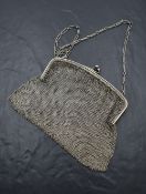 A silver mesh evening bag with clip clasp and carry chain, London 1919, Heasman & Co, bearing import