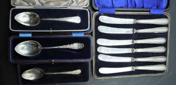 A group of three cased silver spoons, differing dates, makers and design, 58grams gross, sold