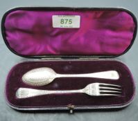 A cased Victorian silver christening set, comprising a Hanovarian pattern spoon and fork, each