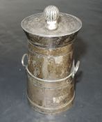 An Edwardian silver pepper mill, formed as a milk churn, marks for Birmingham 1906, maker Hilliard &