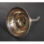 A George III Scottish silver wine strainer, of circular form with gardrooned rim and pierced