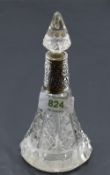 An Edwardian cut glass perfume bottle of conical form having cut glass stopper and moulded silver