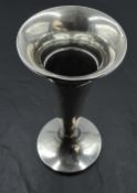 A silver vase of plain trumpet form having a weighted circular base, Birmingham 1922, makers mark