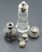 A group of silver mounted glasswares, comprising a sugar/flour sifter, overlayed scent bottle (