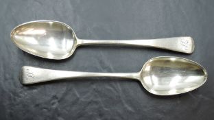 A Pair of George III silver serving spoons, Old English pattern with engraved initials to terminals,