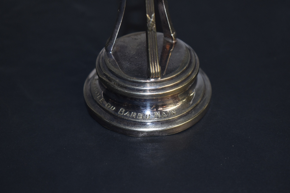 A continental white metal trophy, of half-egg form with cockerel mask ornaments, supported by - Image 4 of 4