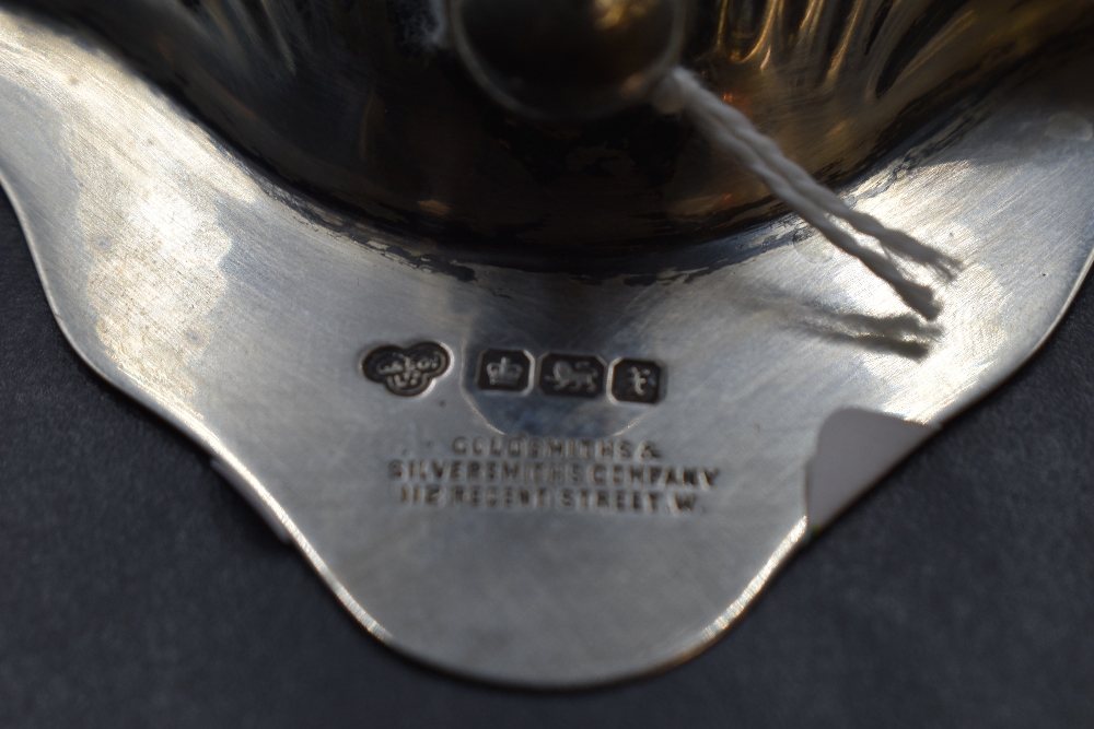 A George V silver pin dish, of scallop shell form and raised on three ball feet, marks for Sheffield - Image 2 of 2