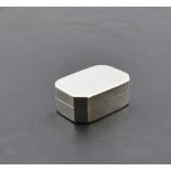 A small Georgian silver vinaigrette of plain canted rectangular form having pierced gilt grill and