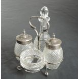 A small Edwardian silver and cut glass condiment set, Birmingham 1902, T H Hazelwood & Co