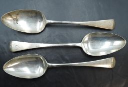 A group of three 19th century table spoons, Old English pattern with engraved initials, differing