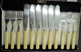 A cased set of ivorine handled silver fish cutlery, six forks and six knives, with marks for