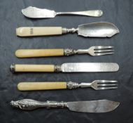 A small selection of silver flatware and cutlery, comprising dessert forks, butter knives, silver