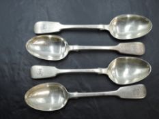 A group of four Victorian silver dessert spoons, fiddle pattern with engraved initials, marks for