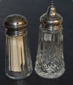Two early 20th century silver topped sugar sifters, each with star-cut screw-off tops, marks for