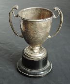 A small Victorian silver two-handled trophy, of traditional design, engraved 'The Wright Cups