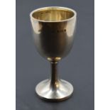 A 1930's silver communion cup, of plain form with spreading circular foot, marks for Birmingham