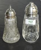 Two glass sugar casters having cut glass decoration and HM silver lids