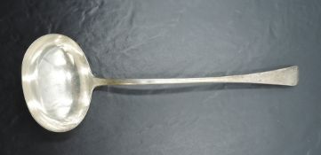 A George III silver ladle, Old English pattern with Hanovarian reverse, the terminal engraved with