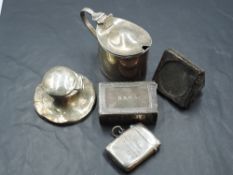 A small mixed selection of silver wares, comprising a vesta case, match box holder, mustard, small