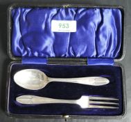 A cased silver christening set, comprising spoon and fork, marks for Sheffield 1943, maker Thomas