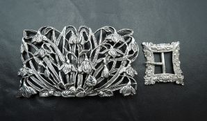 A silver nurses buckle modelled as snowdrops, London 1987, J A Campbell, and a small Victorian