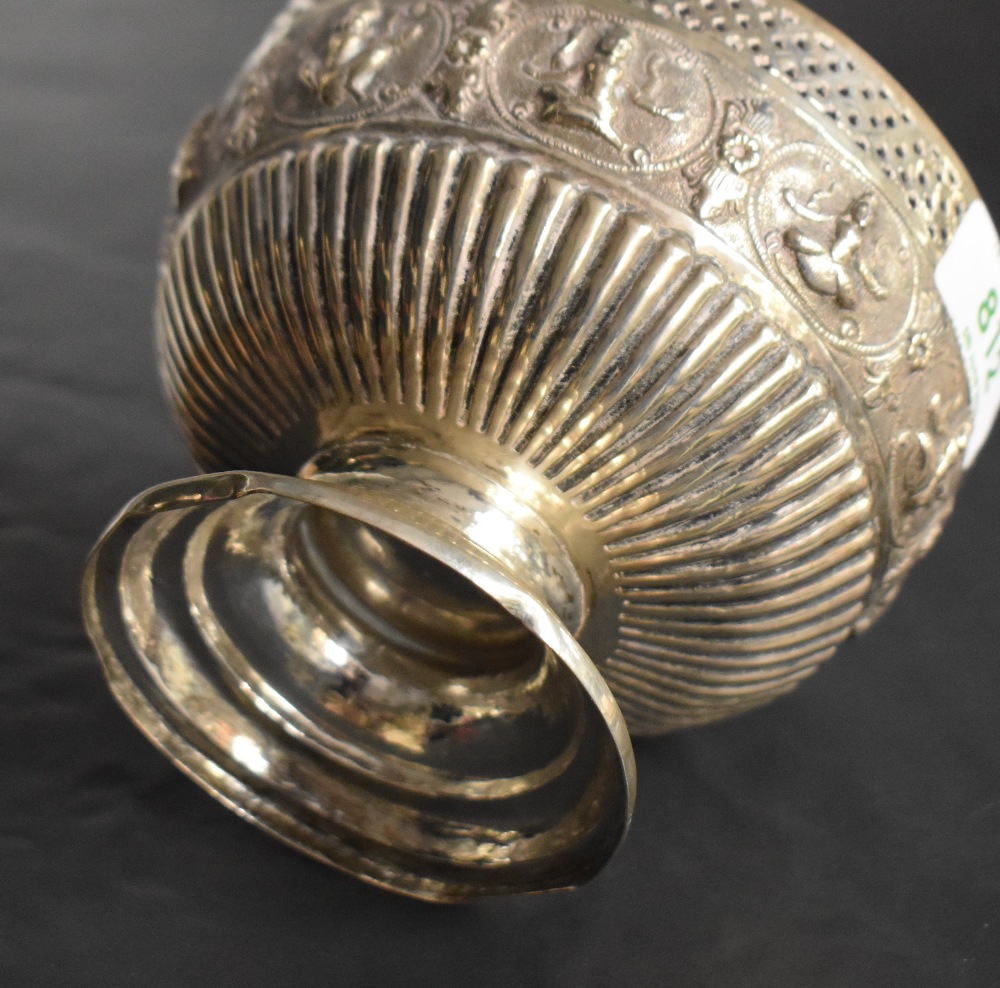 An Indian silver bowl having gadrooned and pierced decoration with central panel bearing images of - Image 2 of 2