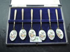 A cased set of six 1960's silver gilt and enamel teaspoons, the bowls enamelled with fruit and