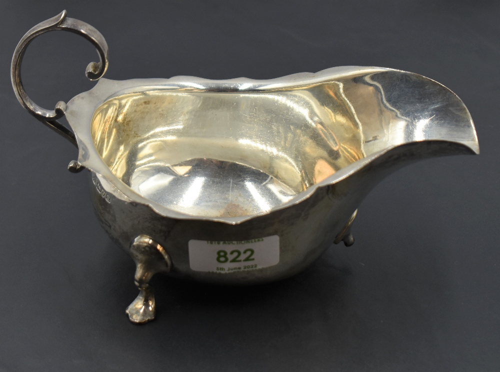 An early 20th century silver gravy boat, of generous proportions with scrolled handle and trefoil - Image 2 of 4