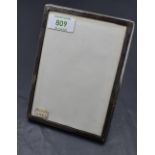 A 1920's silver mounted photograph frame, of plain rectangular form, marks for Birmingham 1922,