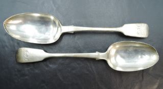 A Pair of Victorian silver serving spoons, fiddle pattern with engraved initials to terminals, marks