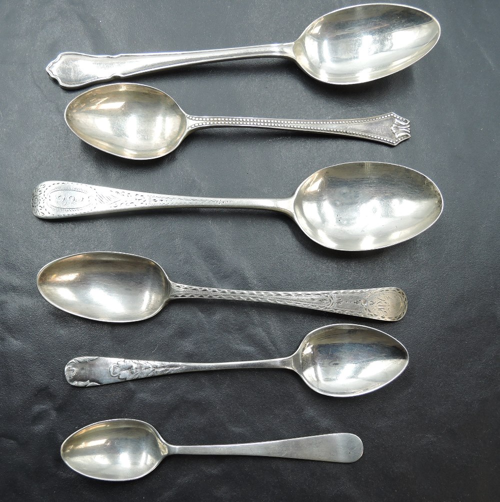 A group of six hallmarked silver spoons, various dates, makers and designs 99grams gross.