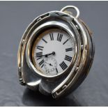 An Edwardian silver mounted horseshoe form pocket watch holder, marks for Birmingham 1906, maker