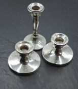 A pair of silver candle sticks of short circular form bearing inscription to front, Birmingham 1919,