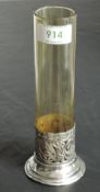 A silver and glass stem vase having cylindrical amber glass vase in a moulded silver base,