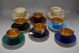 A mid century set of harlequin coffee cups by Royal Copenhagen Confetti along with two Queen