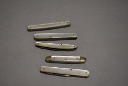 Five antique pocket pen or fruit knives having mother of pearl handles