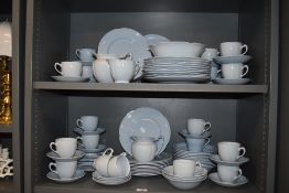A large part dinner and breakfast service by Johnson bros in the Grey Dawn pattern