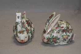 A pair of 20th century Chinese porcelain rabbit figures having decorated bodys