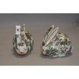 A pair of 20th century Chinese porcelain rabbit figures having decorated bodys