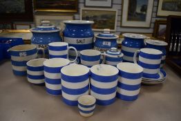 A selection of blue and white wear kitchen storage jars by TG Green and similar mugs