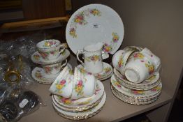 An early 20th century part tea service having hand decorated floral pattern